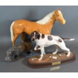 A Beswick Model of a Horse together with a similar model of a Hippopotamus and a Beswick model of