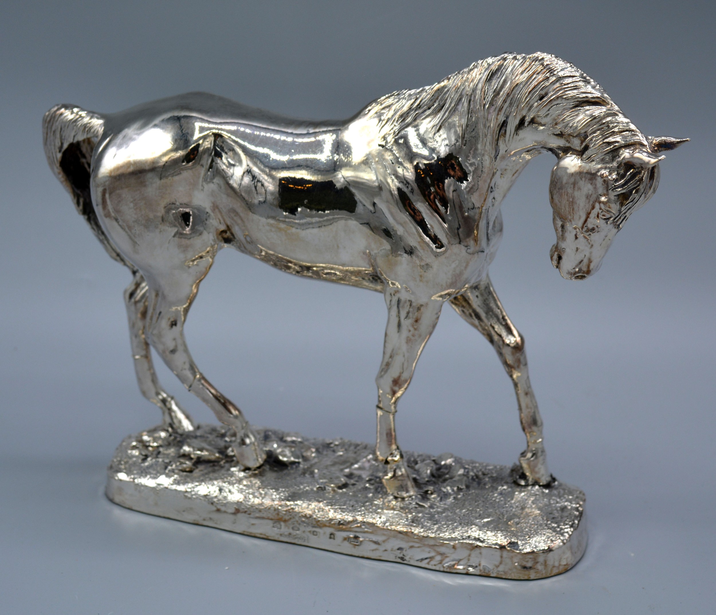 A 925 Silver Model of a Horse resin filled 16.5 cms tall