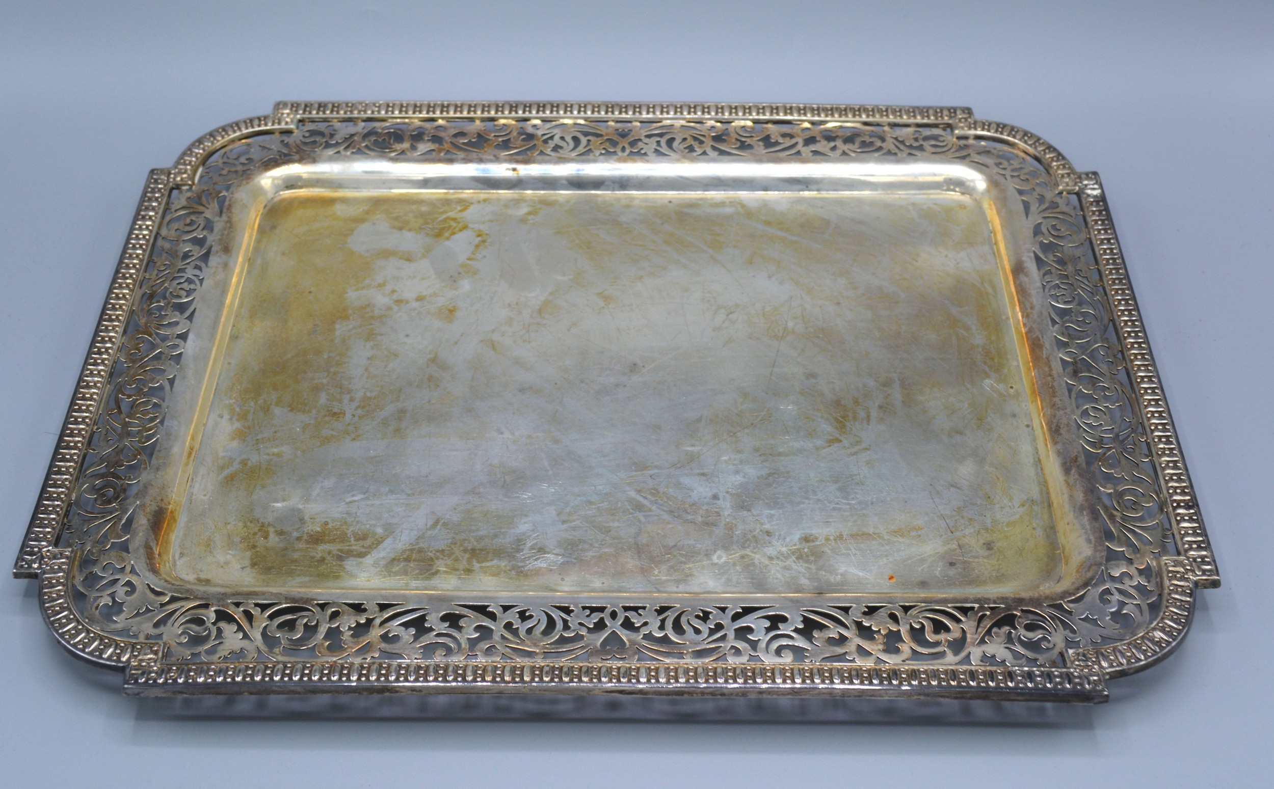 An Edwardian Silver Rectangular Tray with a pierced border London 1906 maker's S.D. Neill. 33 ozs.