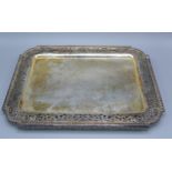 An Edwardian Silver Rectangular Tray with a pierced border London 1906 maker's S.D. Neill. 33 ozs.