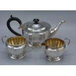 A Birmingham Silver Three Piece Tea Service comprising teapot, two handle sucrier and cream jug,