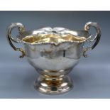 A George V Irish Silver Two Handled Rose Bowl with circular pedestal base Dublin 1918 maker's West &