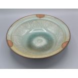 A Chinese Celadon Bowl with metal rim 28 cms diameter