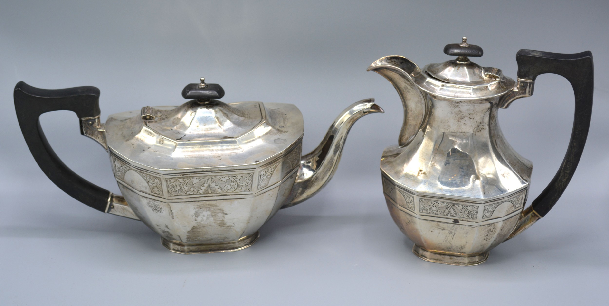 A George V Silver Teapot together with a matching hot water pot Sheffield 1929, 39 ozs. all in