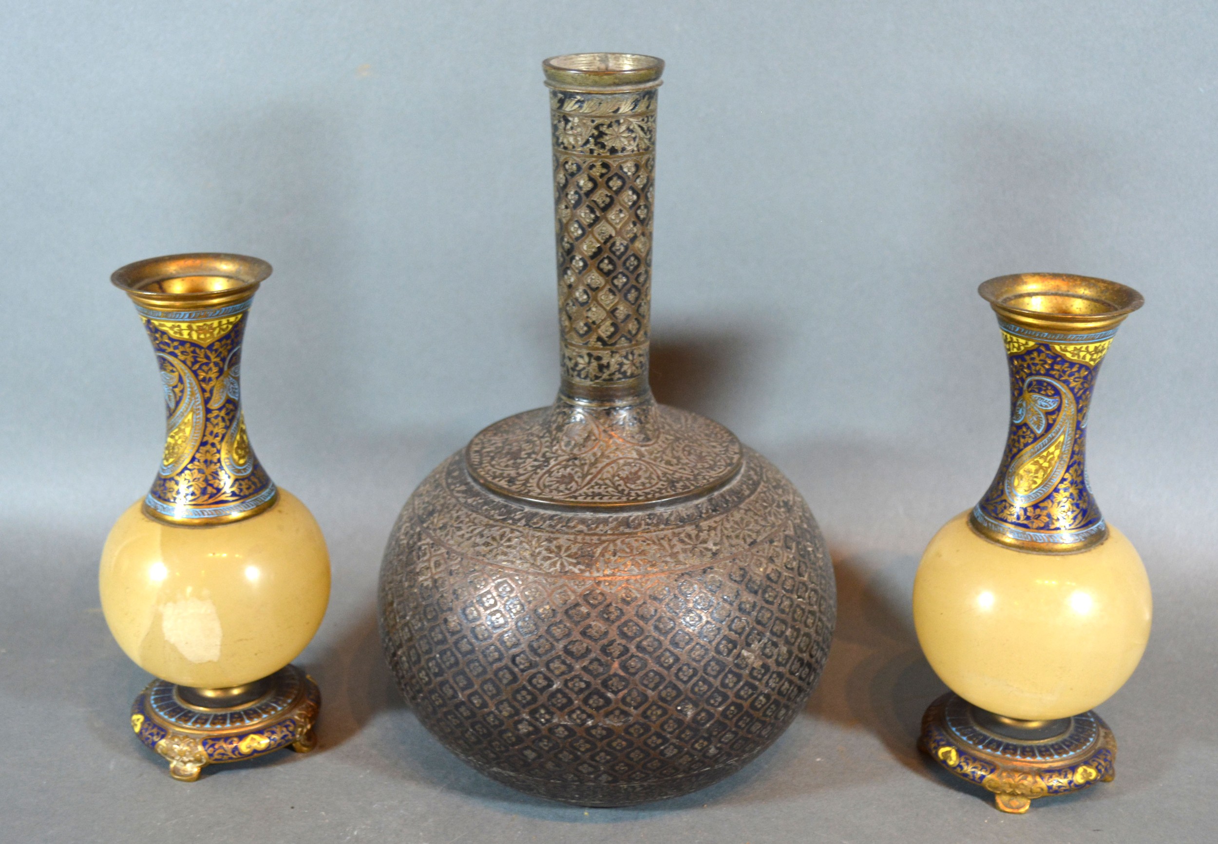 A Pair of Champleve and Onyx Vases 16 cms tall together with an Eastern bottleneck vase 23 cms tall