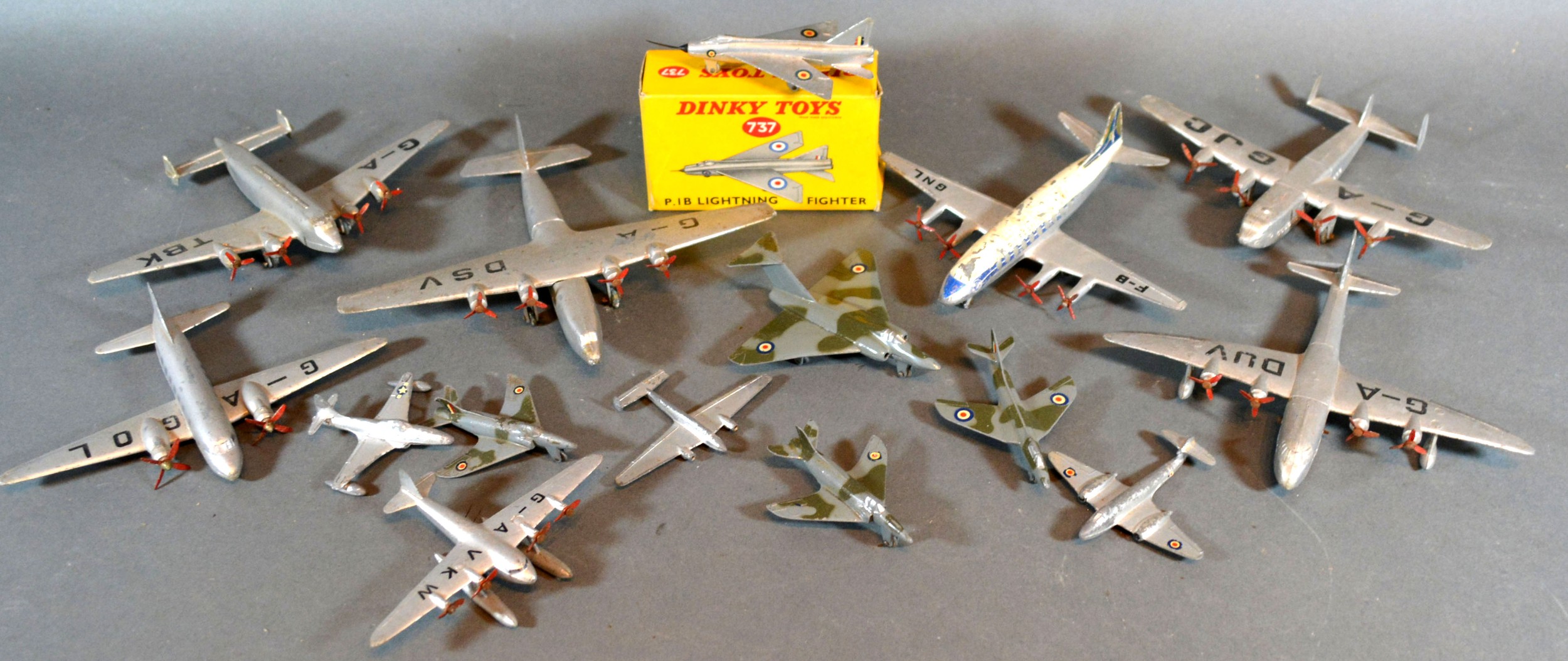A Dinky Toys Empire Flying Boat together with fourteen other Dinky Toys models in the form of