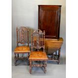 A Pair of Victorian Carved Oak Hall Chairs together with an oak oval gateleg dining table and a 19th