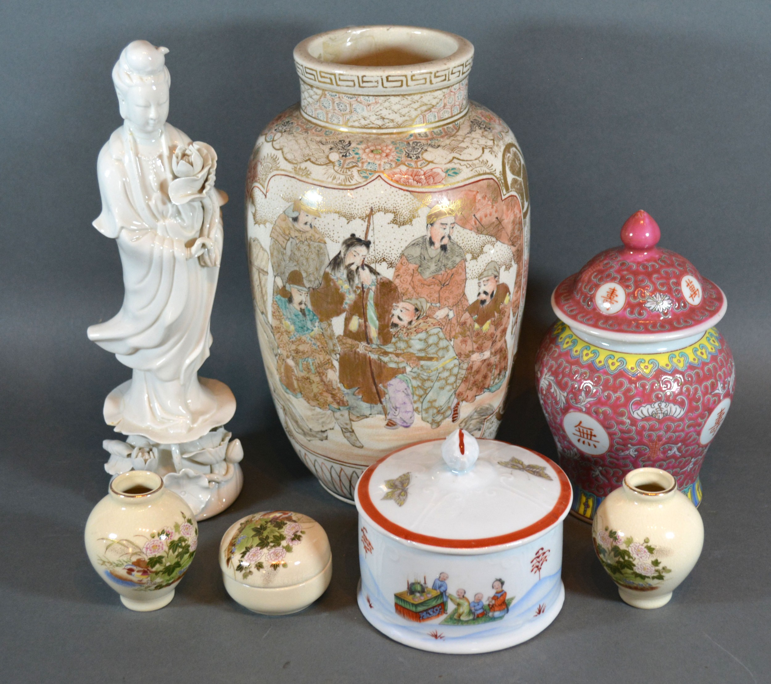 A Satsuma Earthenware Vase 26 cms tall together with a Blanc de Chine figure and various other