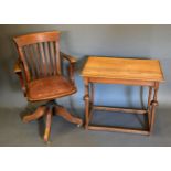 A Victorian Oak Revolving Office Armchair together with a rectangular oak occasional table