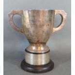 A London Silver Two Handled Trophy Cup with ebonised socle 12 ozs.