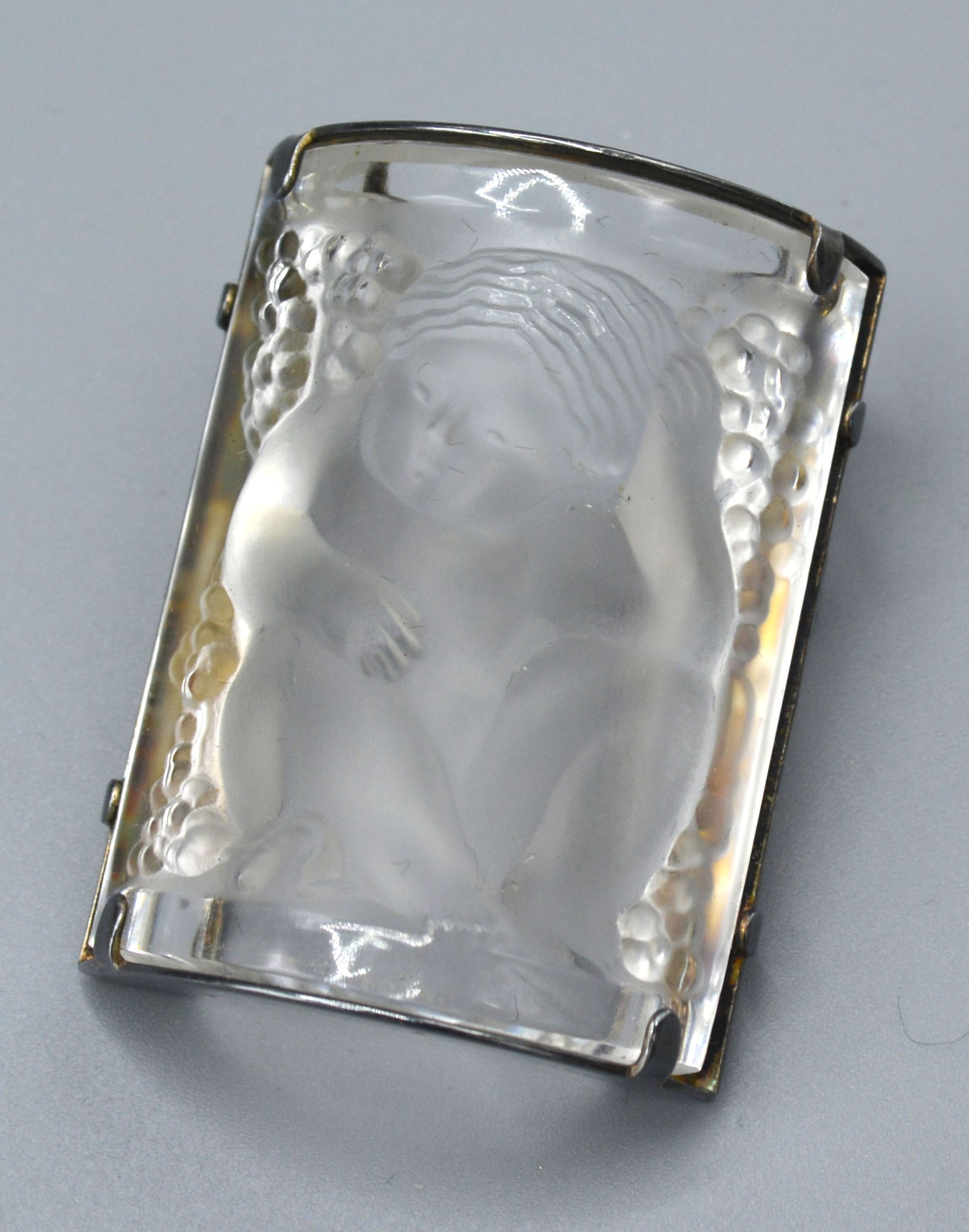 A Lalique Glass Brooch within 925 silver frame marked Lalique France, 4 x 3 cms