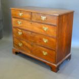 A 19th Century Mahogany Straight Front Chest of two short and three long drawers with brass