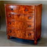 A William IV Mahogany Bow Fronted Chest of two short and three long drawers with spiral half