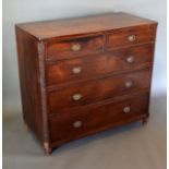A 19th Century Mahogany Chest of two short and three long drawers with oval brass handles raised