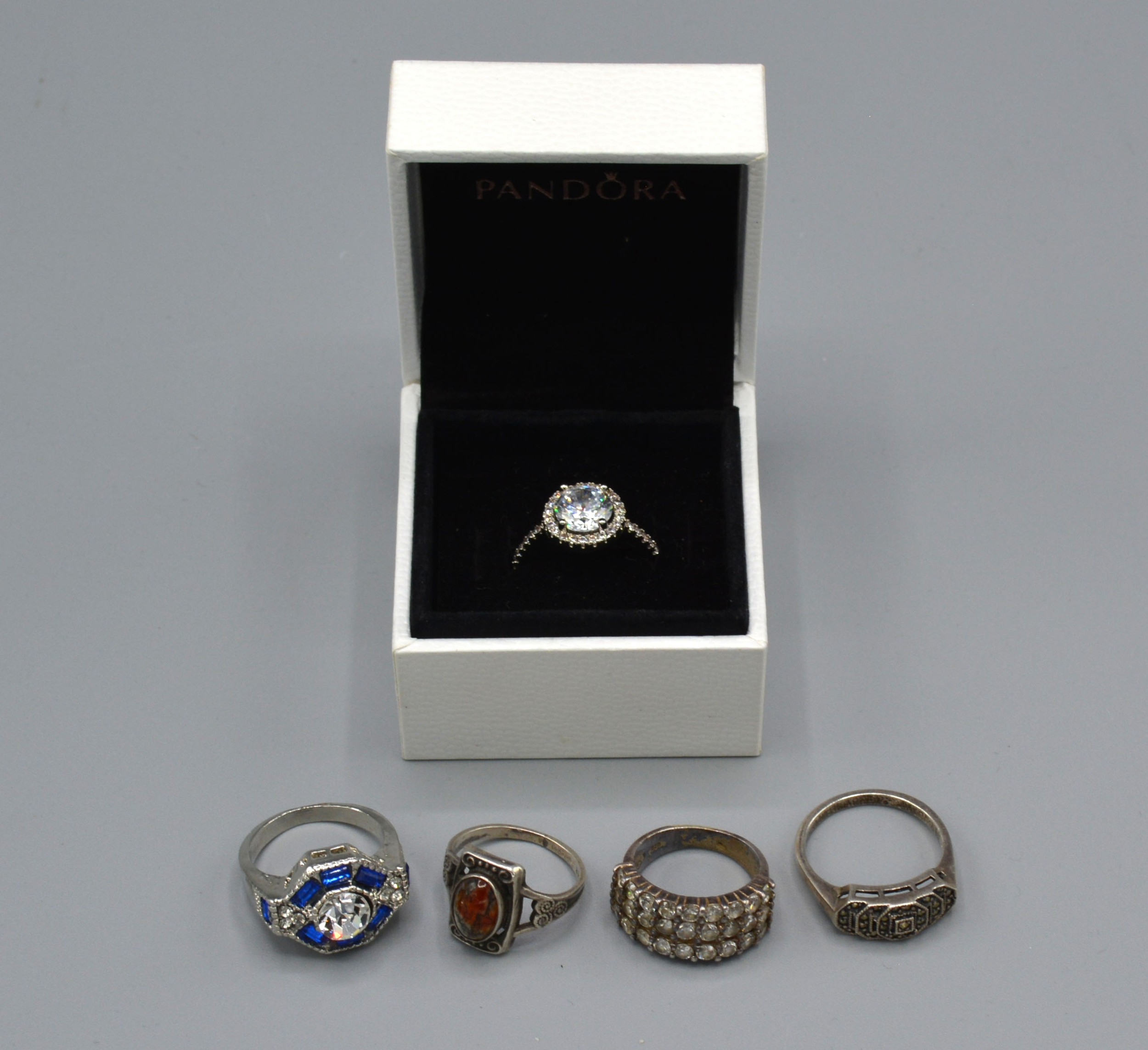 A Dress Ring by Pandora together with four similar dress rings