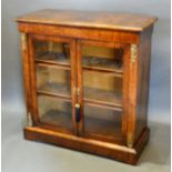 A Victorian Walnut Marquetry Inlaid and Gilt Metal Mounted Pier Cabinet, the two glazed doors