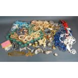 A Collection of Jewellery to include bead necklaces, brooches and other items