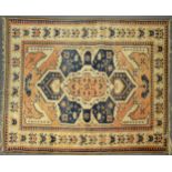 A Turkish Woollen Rug with an all over design upon a terracotta, blue and cream ground within