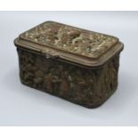 A 19th Century Patinated Metal Musical Box decorated in relief with figures within landscapes 13 x 9