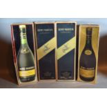 One Bottle Remy Martin Fine Champagne Cognac, boxed together with three other boxed bottles of