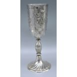 An Art Nouveau Silver Goblet by Gilbert Marks with foliate embossing and circular pedestal base,