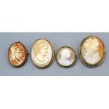 An oval cameo brooch together with three other similar cameos