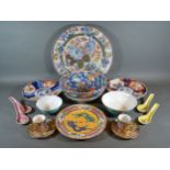 A Chinese Charger together with other related ceramics to include Imari
