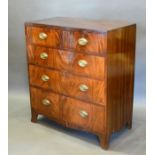 A 19th Century Mahogany Straight Front Chest of two short and three long drawers with oval brass