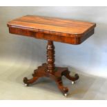 A William IV Rosewood Card Table, the hinged top enclosing a baise lined interior raised upon a