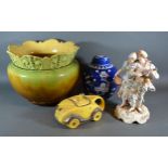 A Woodlesford Art Pottery Jardiniere together with a Sadlers Teapot in the form of a car, a prunus