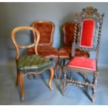 A Victorian Walnut Balloon Back Side Chair together with a similar pair of Victorian side chairs and