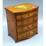 An Edwardian Satinwood Sheraton Revival Miniature Bow Fronted Chest of four drawers, the top hand