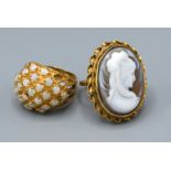 A 9ct. Gold Dress Ring set small opals, ring size L, together with a 9ct. gold cameo dress ring,