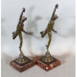 A Pair of Patinated Bronze Models in the form of Mercury upon square marble bases, 23 cms tall