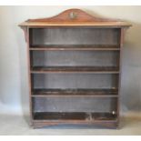 An Arts and Crafts Oak Bookcase, 107 cms wide, 26 cms deep, 122 cms high