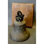 A Bronze Ship's Bell from HMS Solway Firth dated 1945 complete with oak plaque, 38 cms tall
