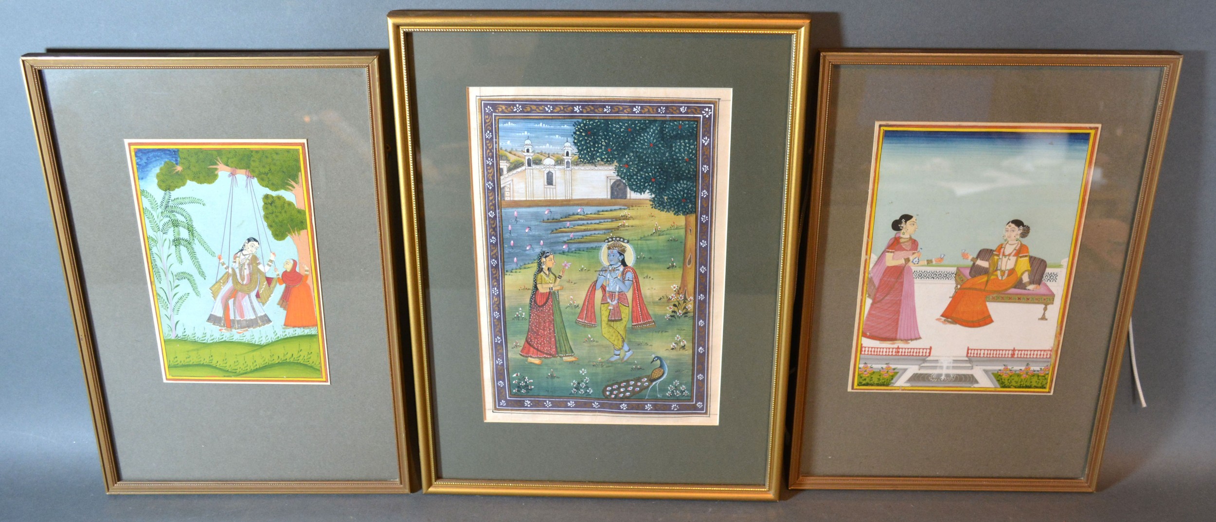 A Group of Three Moghul Watercolours depicting figures within landscapes