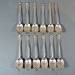 A Set of Twelve Victorian Silver Teaspoons with scallop form bowls, London 1898/99 5 ozs.