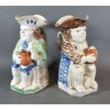 An 18th/19th Century Pearlware Toby Jug together with another similar, 24 cms tall