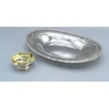 A Sterling Silver Oval Dish by Tiffany & Co. with a pierced shaped border, 9 ozs., 20.5 x 28.5 cms