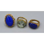 A 9ct. Gold Dress Ring set cabochon blue stone together with another similar and another 9ct. gold