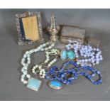 A Small Collection of Jewellery to include bead necklaces together with a rectangular photograph