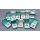 A Collection of Eleven Silver Dress Rings set various stones