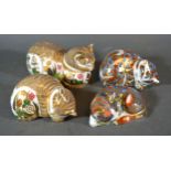 A Royal Crown Derby Paperweight 'Cottage Garden Cat' another 'Cottage Garden Kitten' another 'Cat