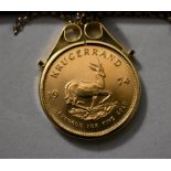 Gold Krugerrand 1974 KM 73, approx 33 Grams .900 on a long fine 9ct Gold Chain, boxed.