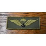 Canadian Service Dress Cloth Paratroop Wings with black maple leaf.