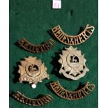 Bedford Regt, Bedfordshire & Hertfordshire Regt Cap badges plus two pairs of shoulder titles