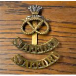 Staffordshire Regiment (Prince of Wales's) Cap Badge and pair of Shoulder Titles. K&K: 2050 worn