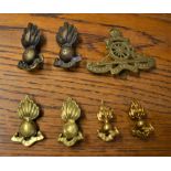 Royal Artillery WWII Cap Badge and three pairs of Officers Collar Badges, a good collection.