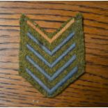 British Army Blue Overseas Service Stripes Chevron Cloth Patch, worn on the WWII Service Uniform